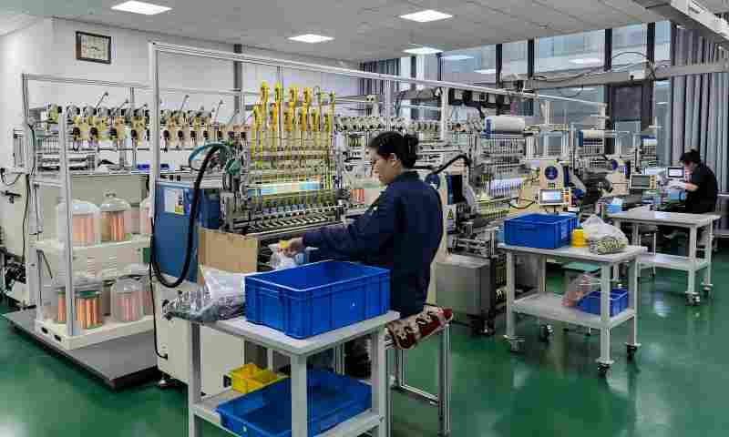 Professional winding workshop with precision automated winding machines
